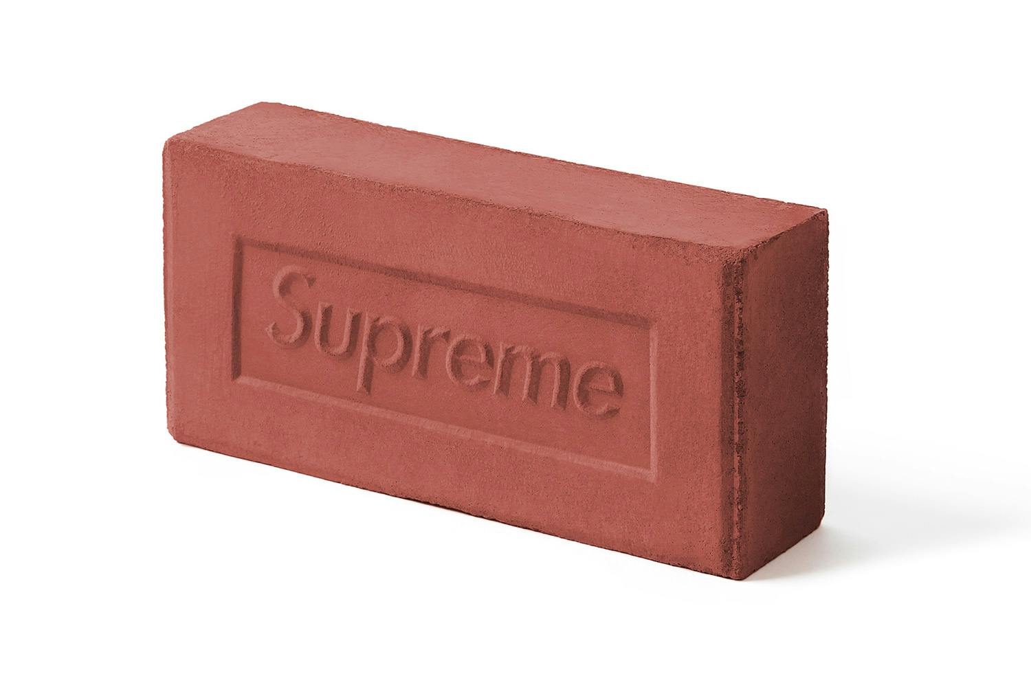 Red brick with 'Supreme' branding on a white background
