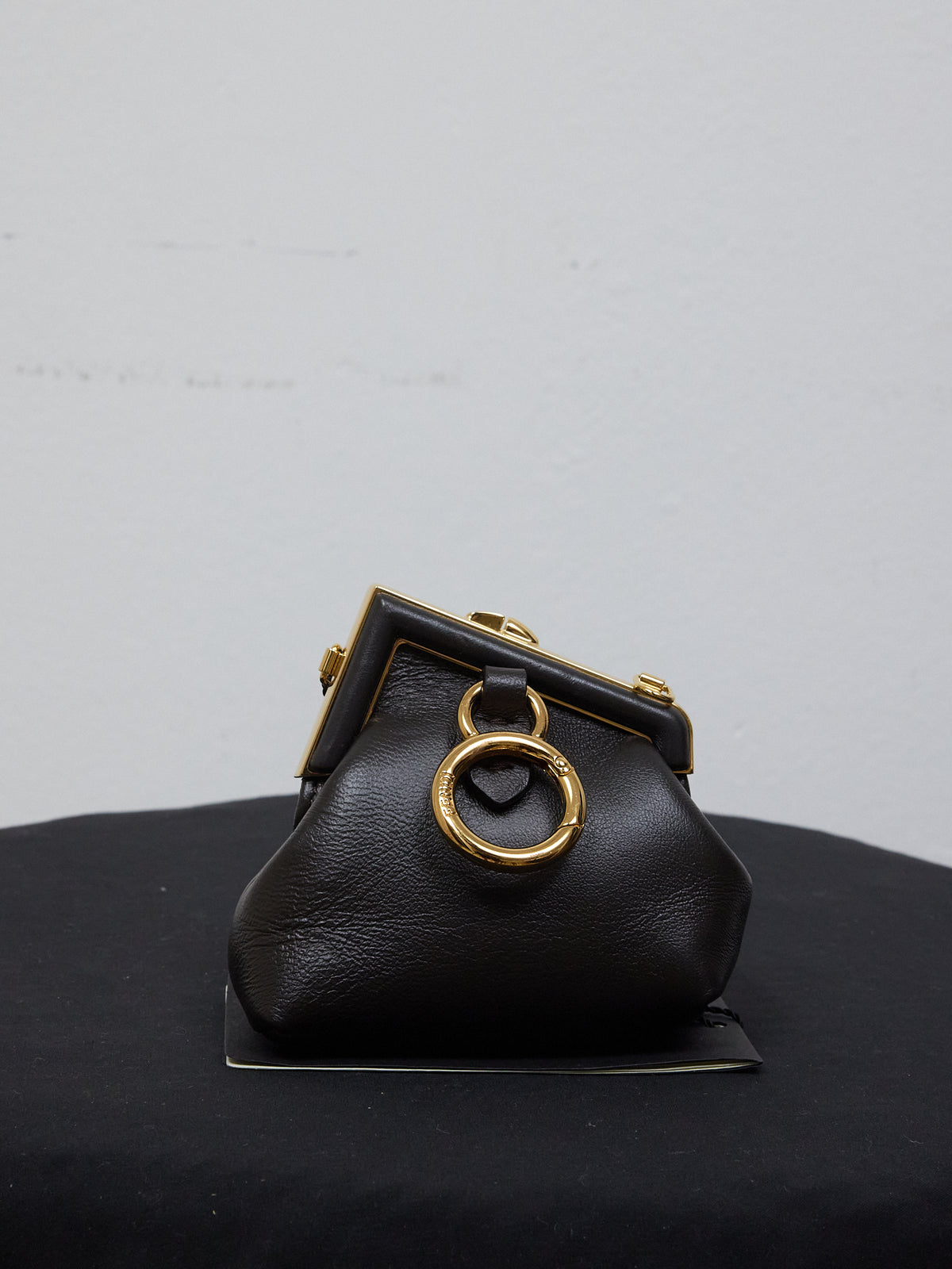 Fendi First Micro Charm Pochette Bag in Black