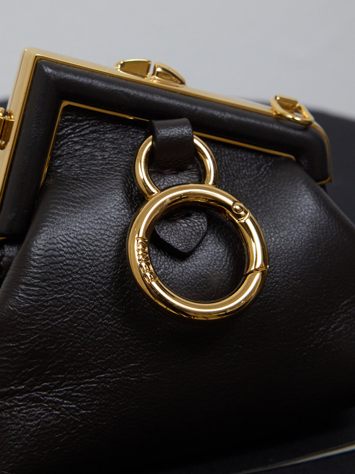 Fendi First Micro Charm Pochette Bag in Black