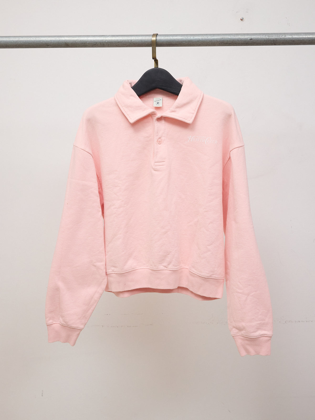 Sporty & Rich Rizzoli Cropped Cotton Polo Sweatshirt in Pink