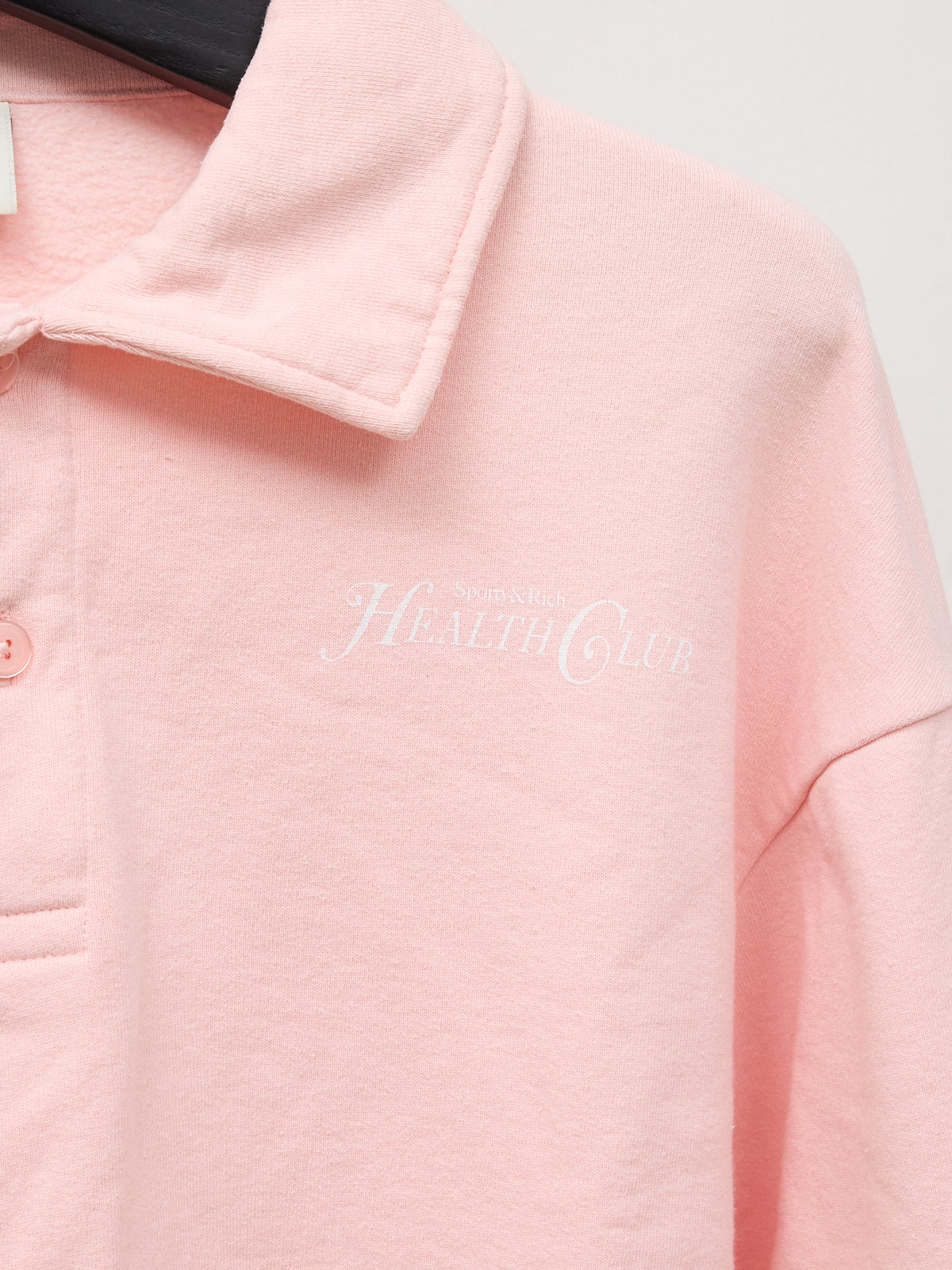 Sporty & Rich Rizzoli Cropped Cotton Polo Sweatshirt in Pink