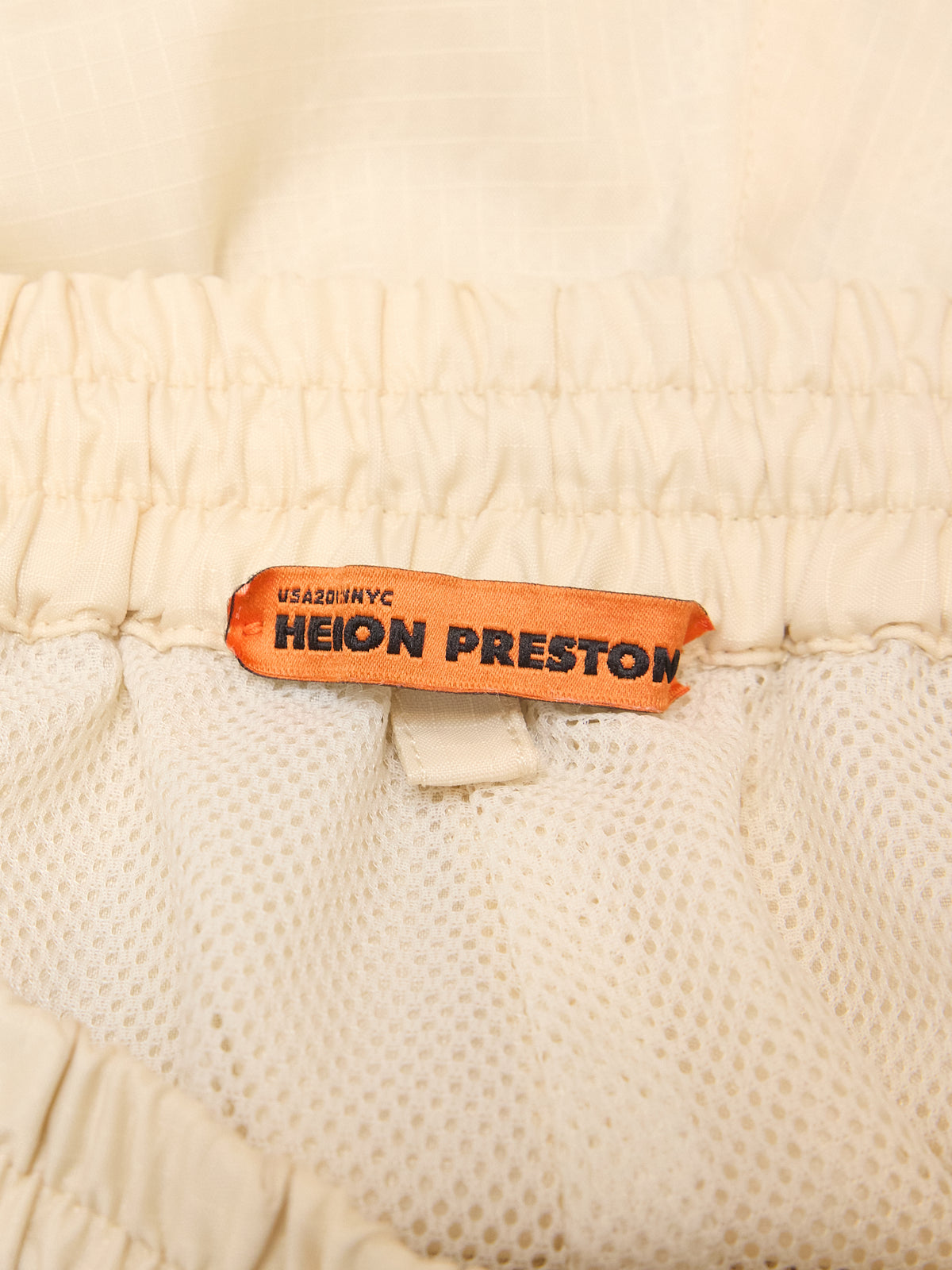 Heron Preston Nylon Shorts in Beige/Orange