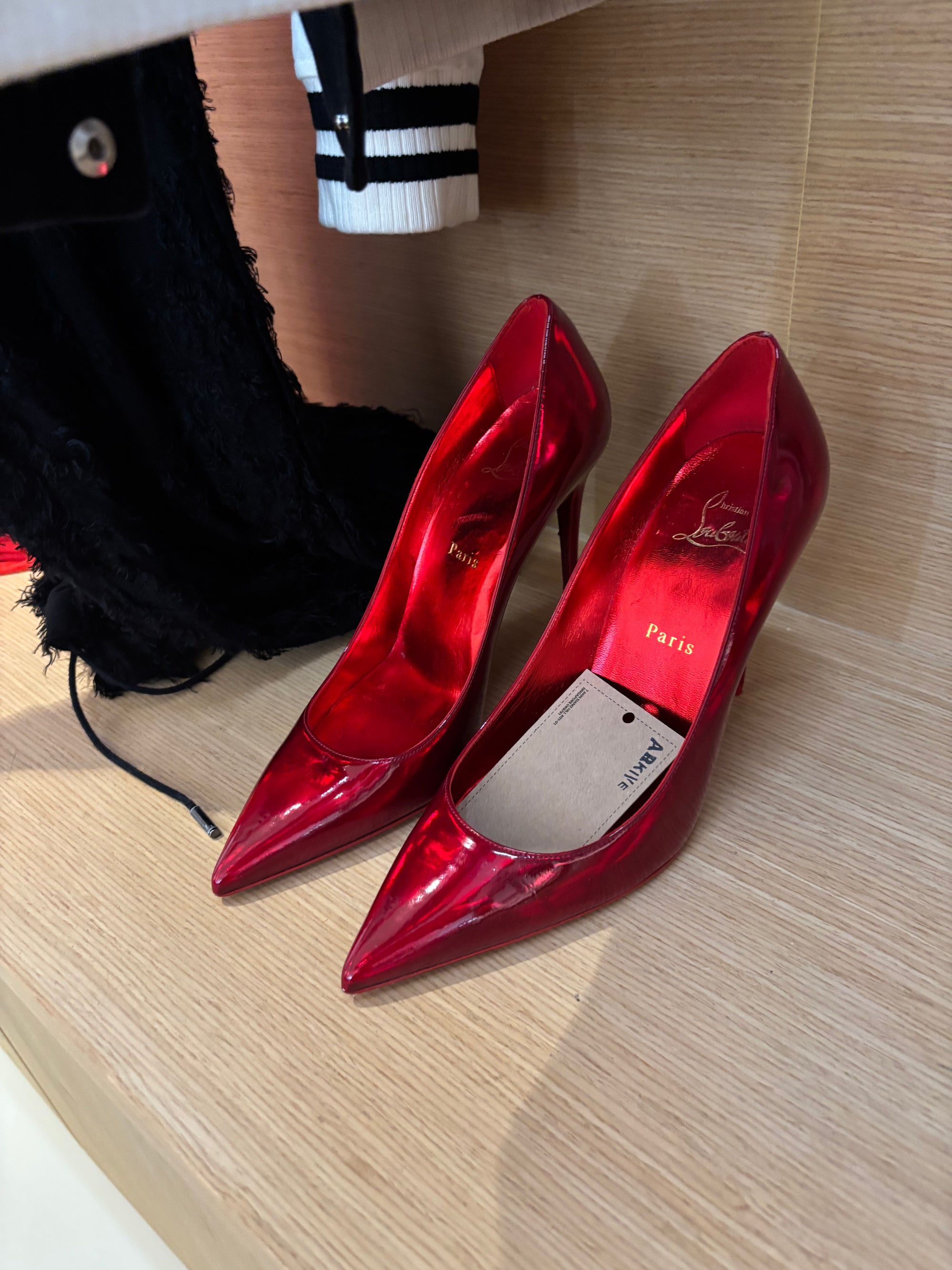 LOUBOUTIN REFLECTIVE RED HEEL